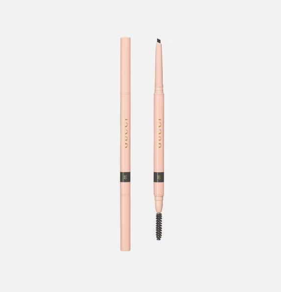 Pink eyebrow pencil with black tip on a light gray background