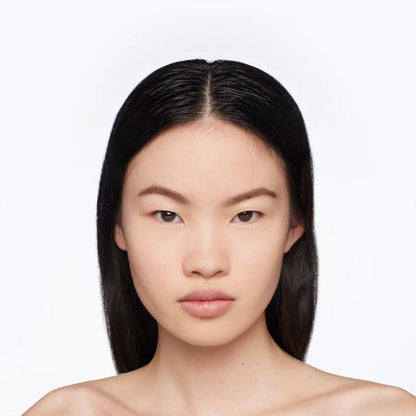 Woman with long black hair on a white background
