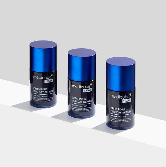 Three bottles of Medicube Zero Pore One Day Serum on a white background