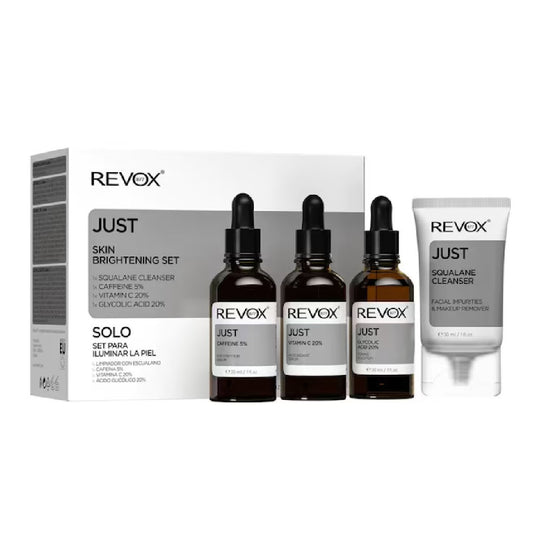 Revox skincare product set including bottles and a cleanser on a white background