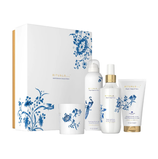 Skincare product set with floral design on packaging against a white background