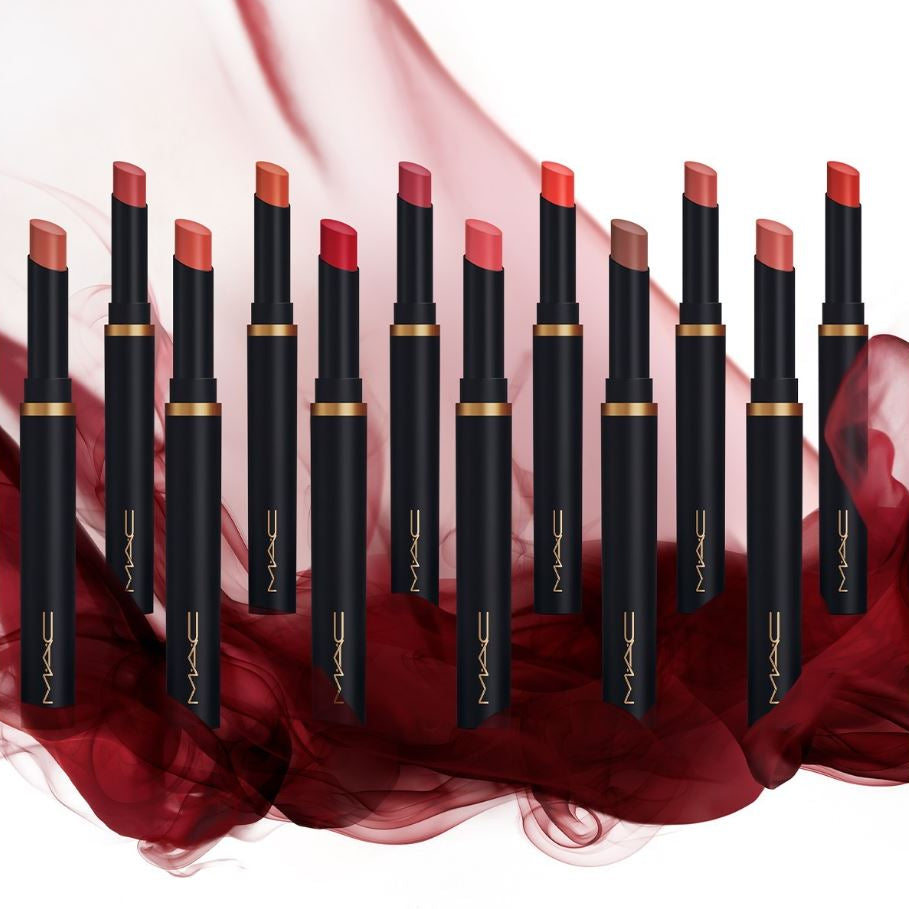 MAC lipsticks displayed on a red fabric background