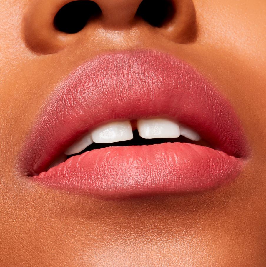 Close-up of a person's lips with a focus on the lipstick color.