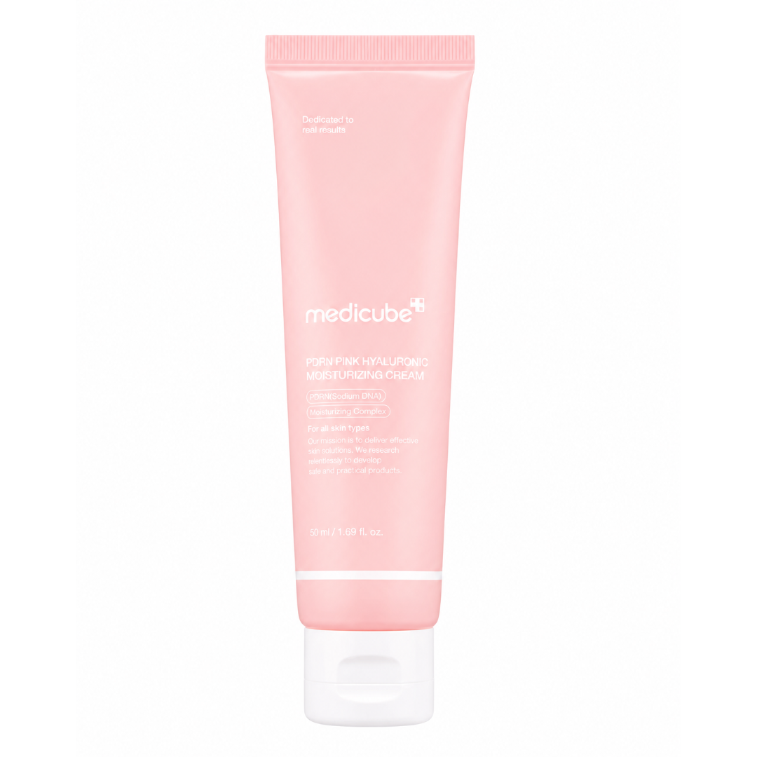 Pink tube of Medicube product on a white background