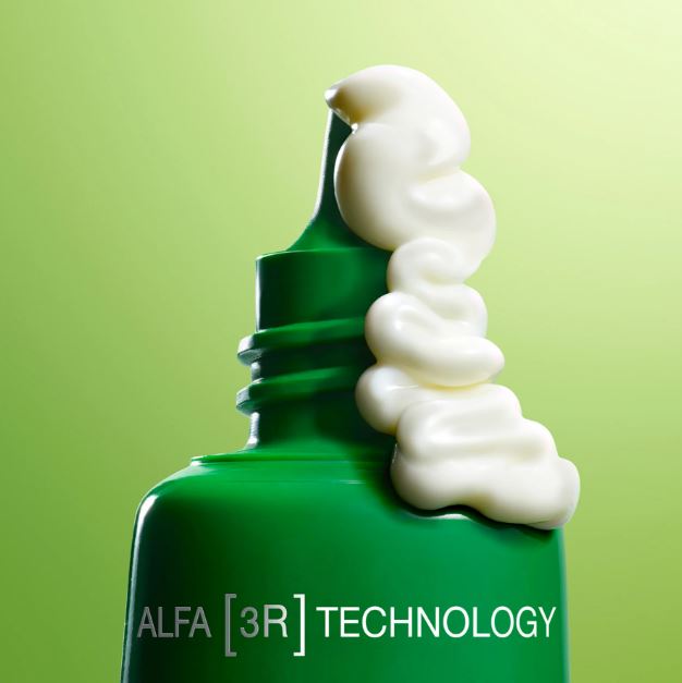 Green bottle with white cream on a green background, featuring 'ALFA [3R] TECHNOLOGY'.