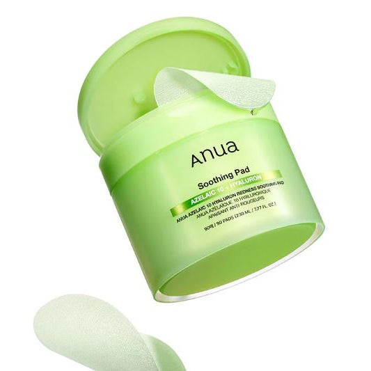 Green container of anua soothing pads with a white background