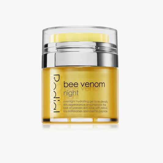 Skincare jar labeled 'bee venom night' on a white background