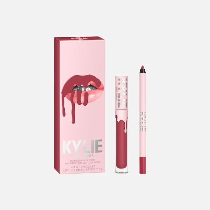 Kylie lip kit with pink packaging and red lipstick on a white background