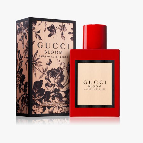 Gucci Bloom perfume bottle and packaging on a white background