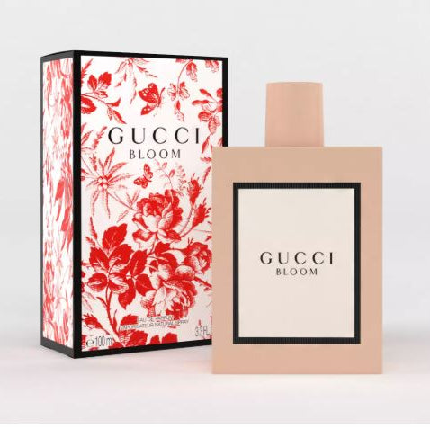Gucci Bloom perfume bottle and packaging on a white background