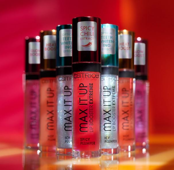 Catrice lip products including 'MAX IT UP' and 'MAX IT UP LIP BOOSTER EXTREME' on a red background