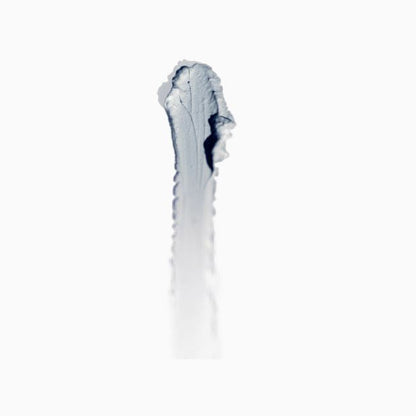 White ceramic knife with blue floral pattern on a white background