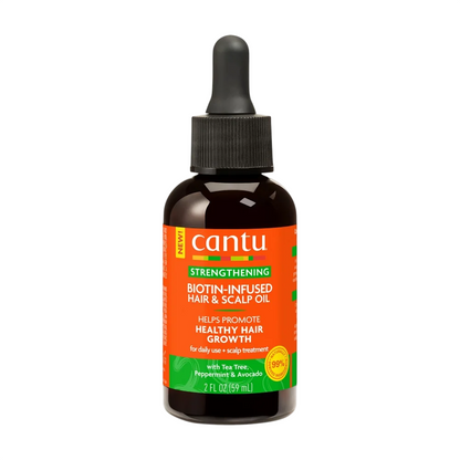 Cantu strengthening biotin-infused hair and scalp oil bottle on a white background