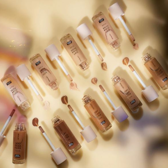 Collection of Maybelline Super Stay 24H Liquid Lipsticks with applicators on a light background