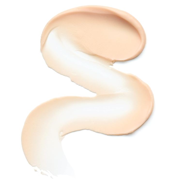 Two swatches of beige foundation on a white background