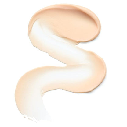 Two swatches of beige foundation on a white background