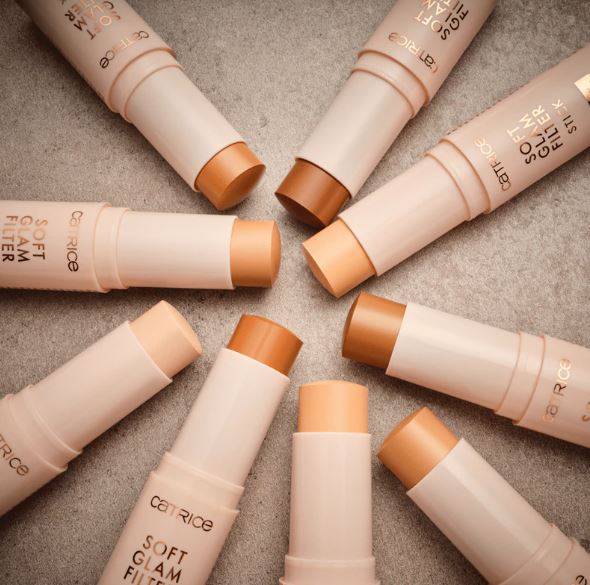 Catrice makeup sticks on a textured surface