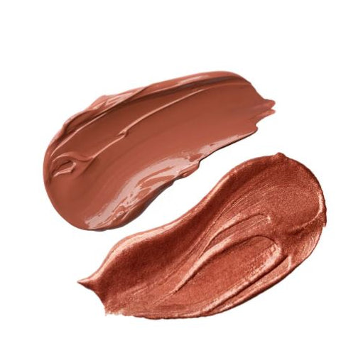 Two swatches of brown makeup cream on a white background
