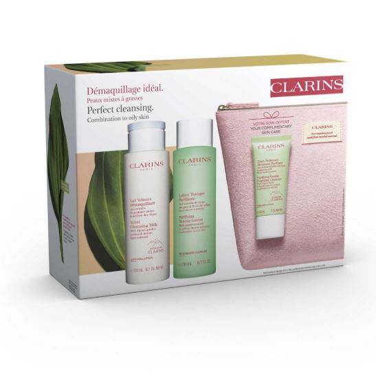 Clarins skincare product set with bottles and a pouch on a white background