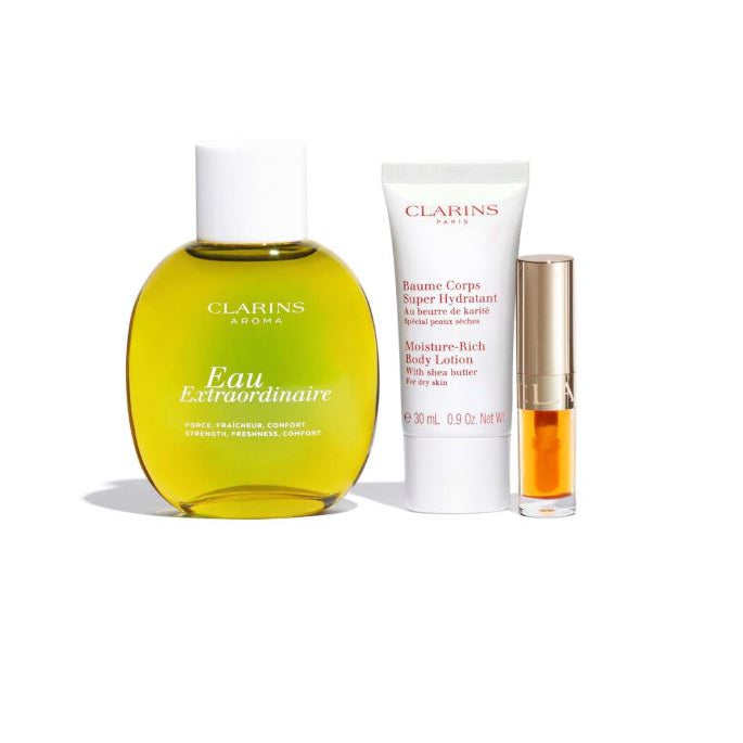 Clarins skincare products including a bottle, lotion, and serum on a white background