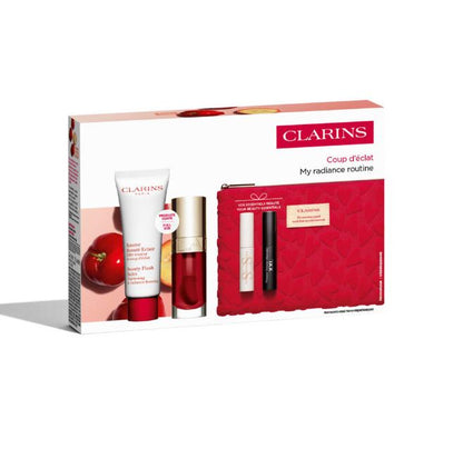 Clarins beauty set with products and packaging on a white background