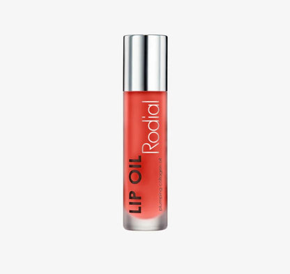 Rodial lip oil with silver cap on a white background