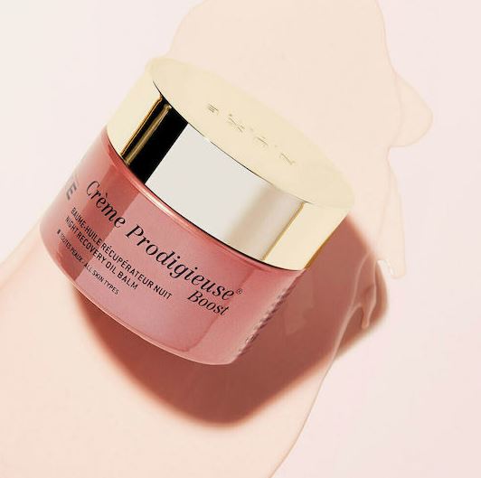 Bobbi Brown Creme Prodigieuse jar on a light pink background