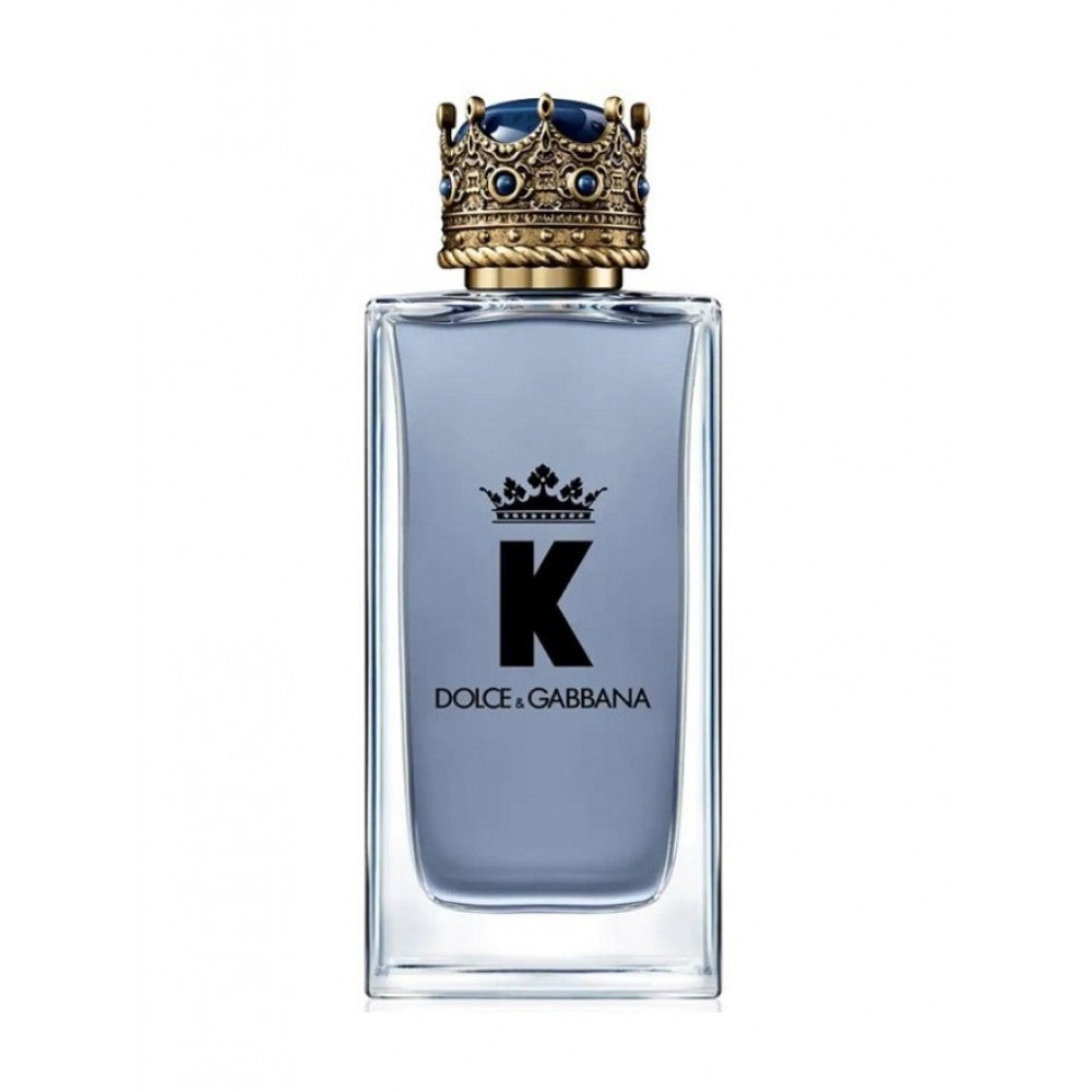 Dolce & Gabbana K perfume bottle with decorative cap on a white background