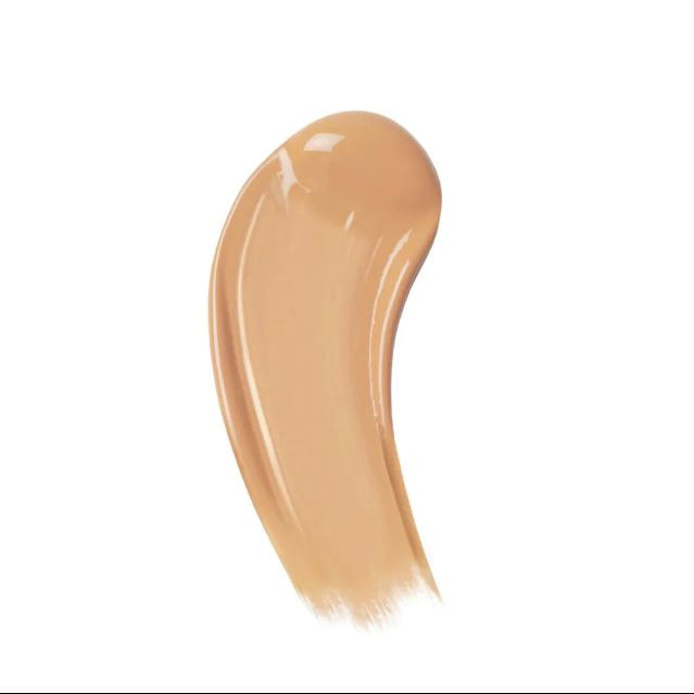 Beige makeup swatch on a white background