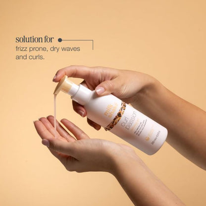 Hand holding a bottle of hair care product with text on a beige background