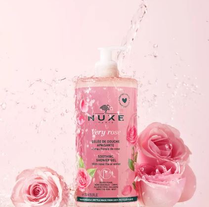 Nuxe Very Rose shower gel bottle with pink roses on a light pink background