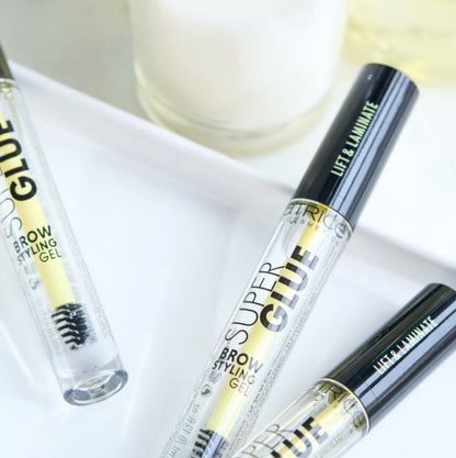 Super Glue Brow Styling Gel bottles on a white surface