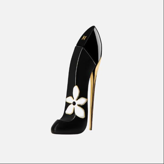 Black high-heeled shoe with a white flower design on a light gray background
