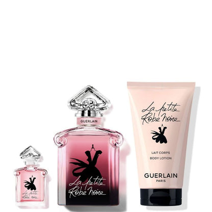 Guerlain perfume and body lotion set on a white background