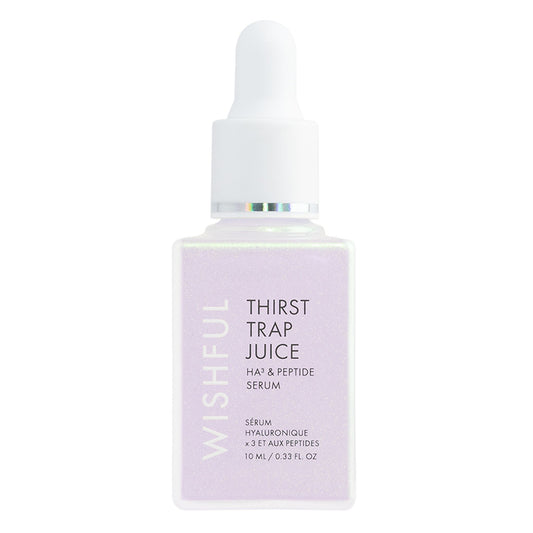 Wishful Thirst Trap Juice hair and peptide serum bottle on a white background