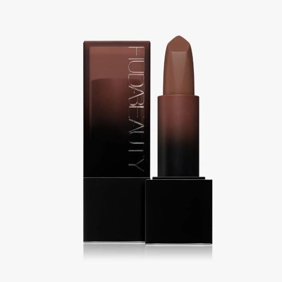 Brown lipstick with black case on a white background