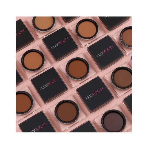 Makeup product set with 'HUDNEITY' branding on a white background