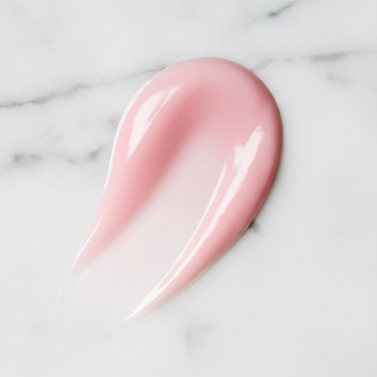 Rodial Collagen Plumping Lip Oil Original Pink – soft baby pink gloss texture swatch