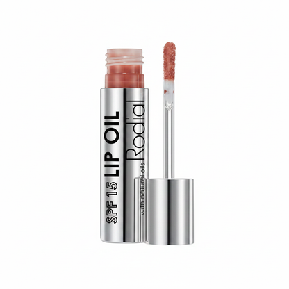 Rodial SPF 15 Lip Oil silver tube open with applicator wand high resolution