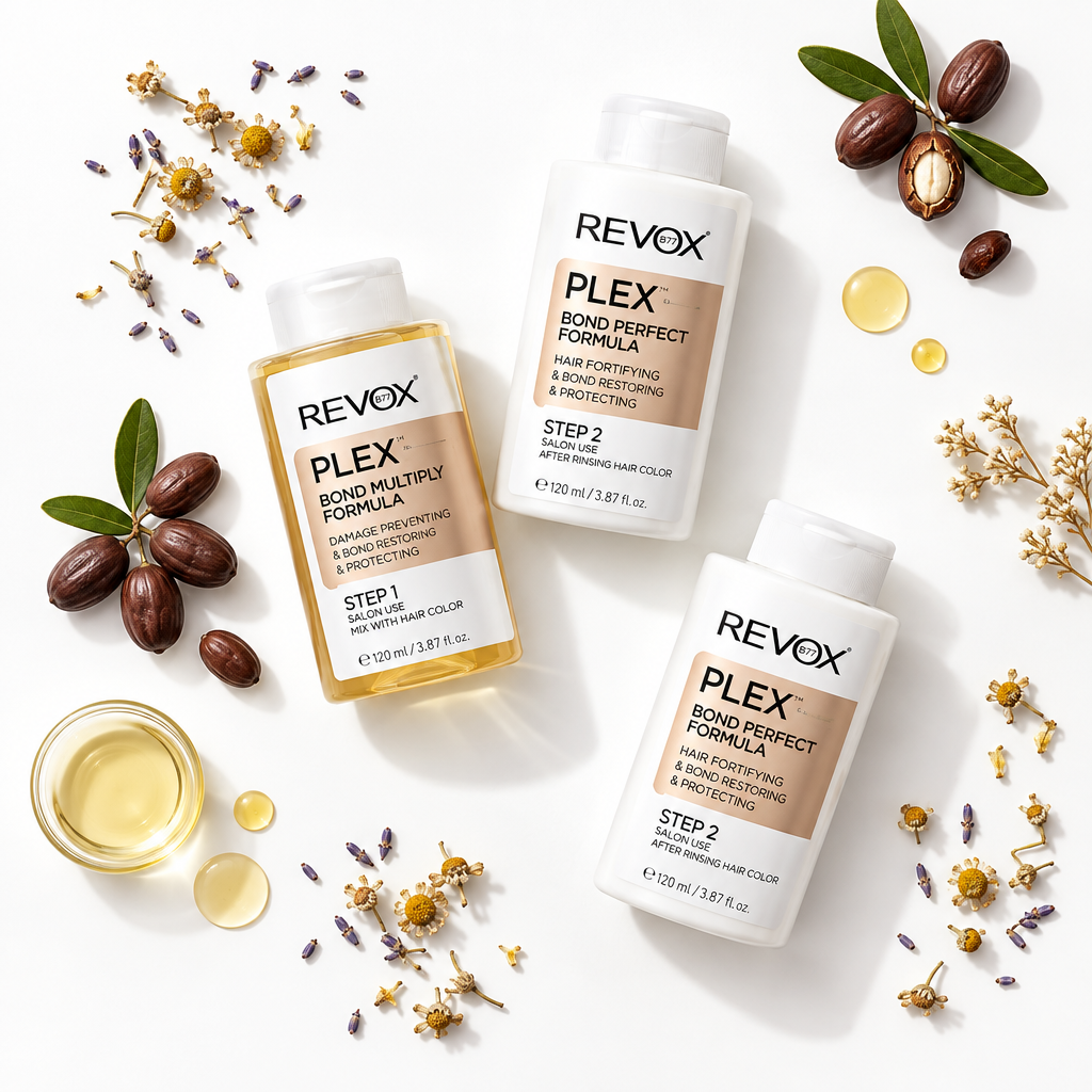 Three bottles of REVOX PLEX hair color in Step 1, Step 2, and Step 3 are arranged in a styled flat-lay with hair color liquid, almond halves, and dried flowers on a white background.