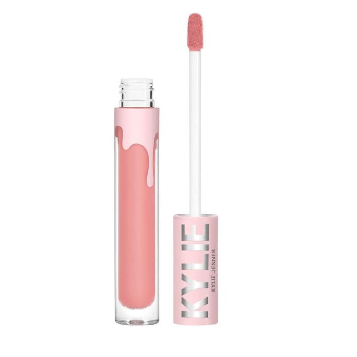 Pink lip gloss with applicator on a white background