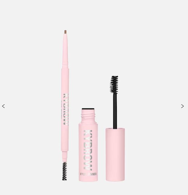 Pink makeup set with an eyebrow pencil and mascara on a white background