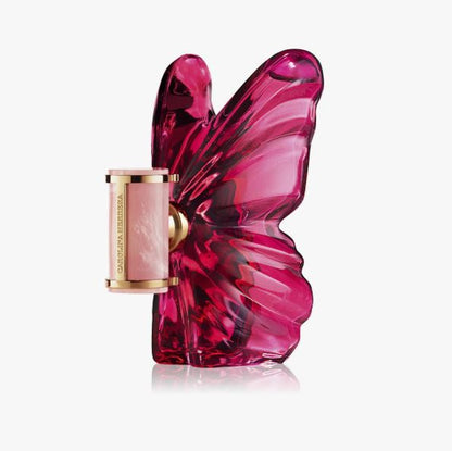 Pink butterfly-shaped perfume bottle on a white background