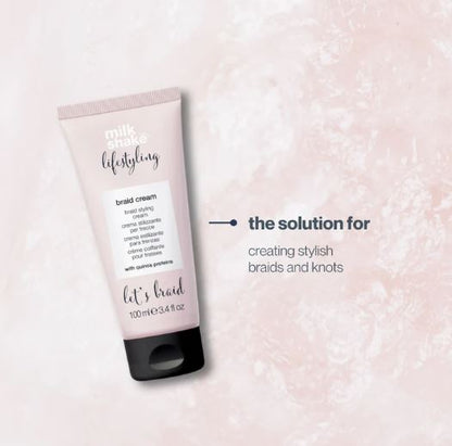 Tube of milk_shake styling braid cream on a pink textured background