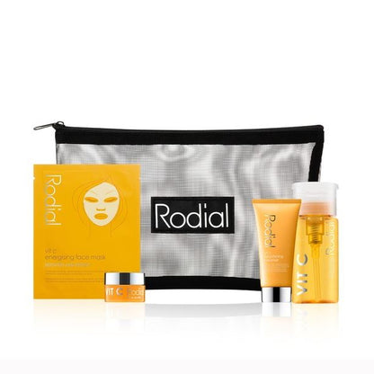 Rodial skincare products including a pouch, face mask, and bottles on a white background