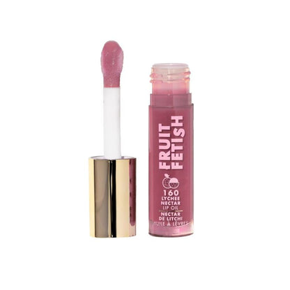 Pink lip oil with applicator and 'Fruit Fetish' branding on a white background