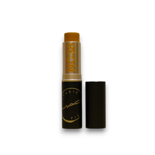 Makeup stick with black casing on a white background