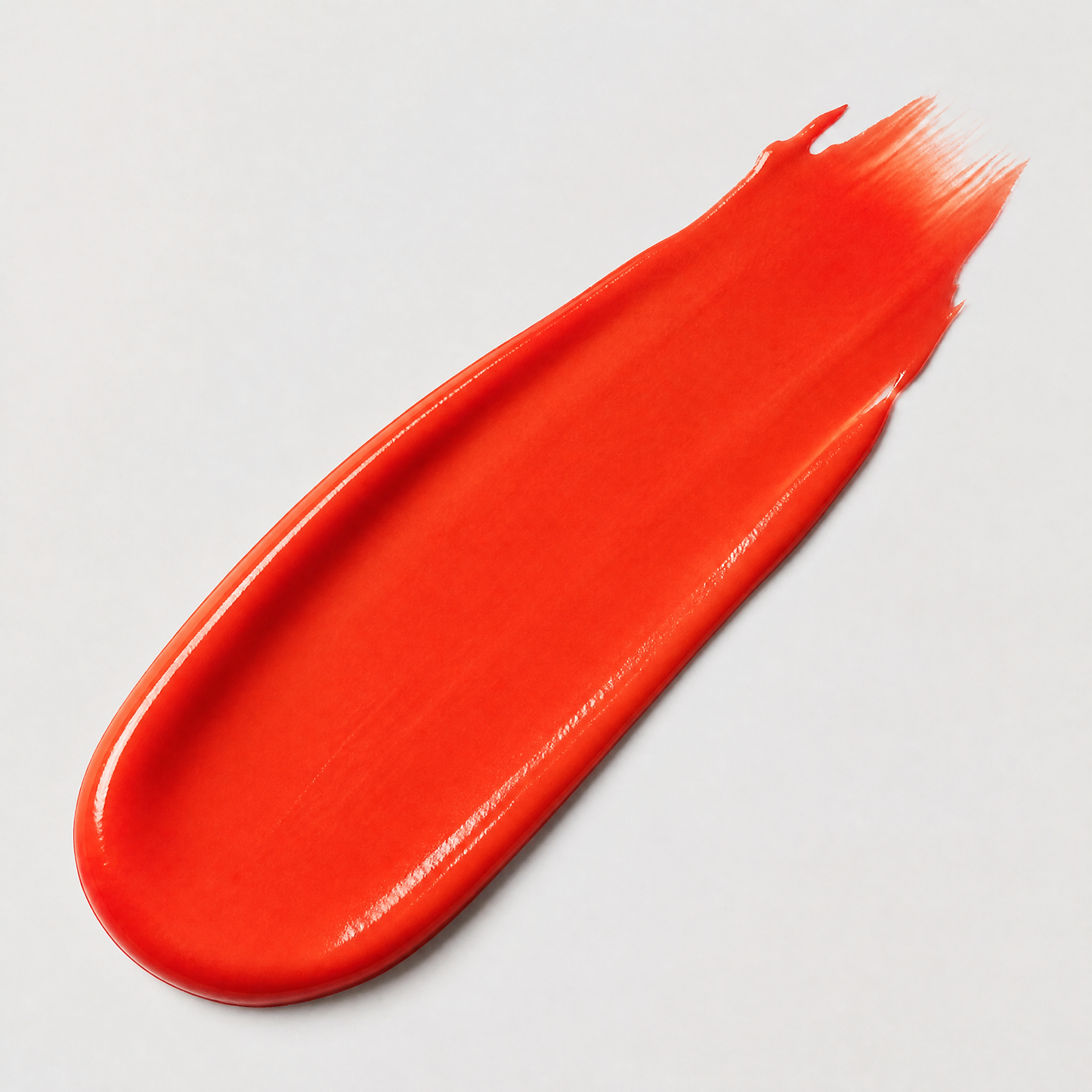 Red paint swatch on a gray background