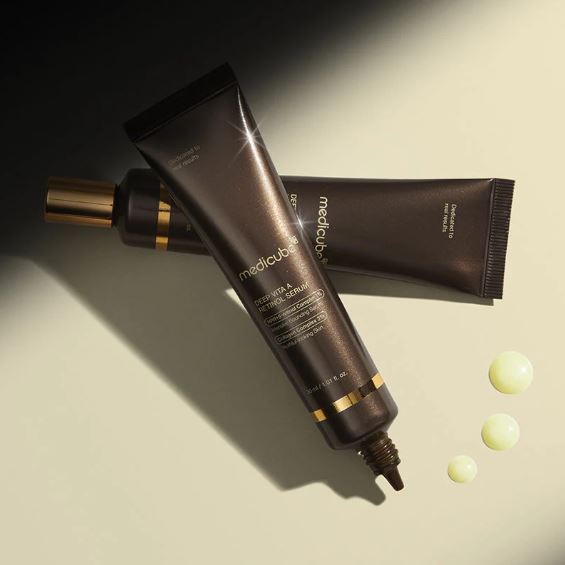MediCure skincare product with applicator on a neutral background