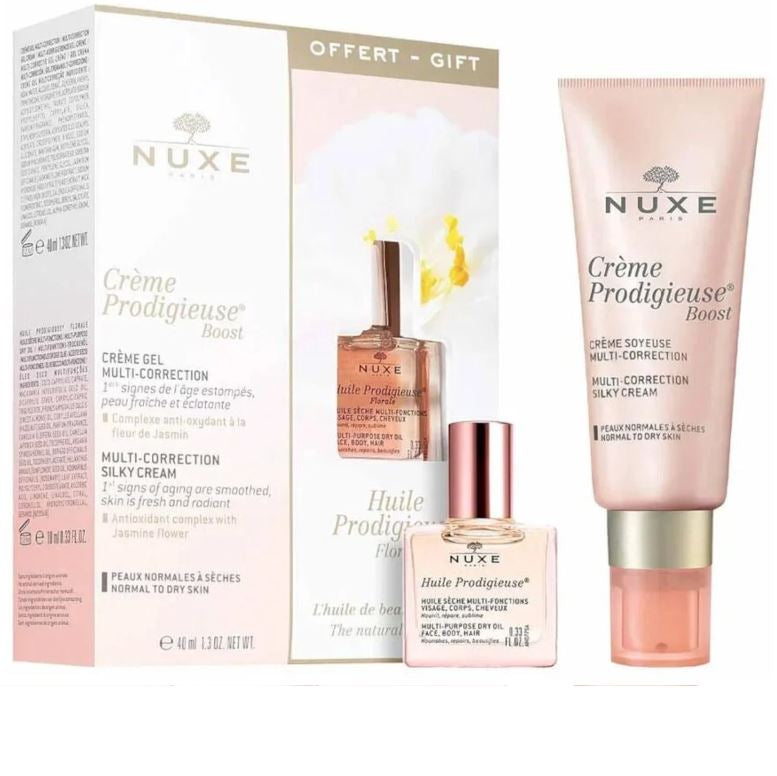 Nuxe skincare product set including cream, oil, and other items on a white background